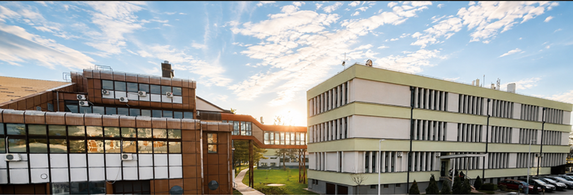 Faculty of Engineering buildings at the University of Kragujevac, Serbia, shown in the news item announcing the visiting-professor appointment and the research partnership.